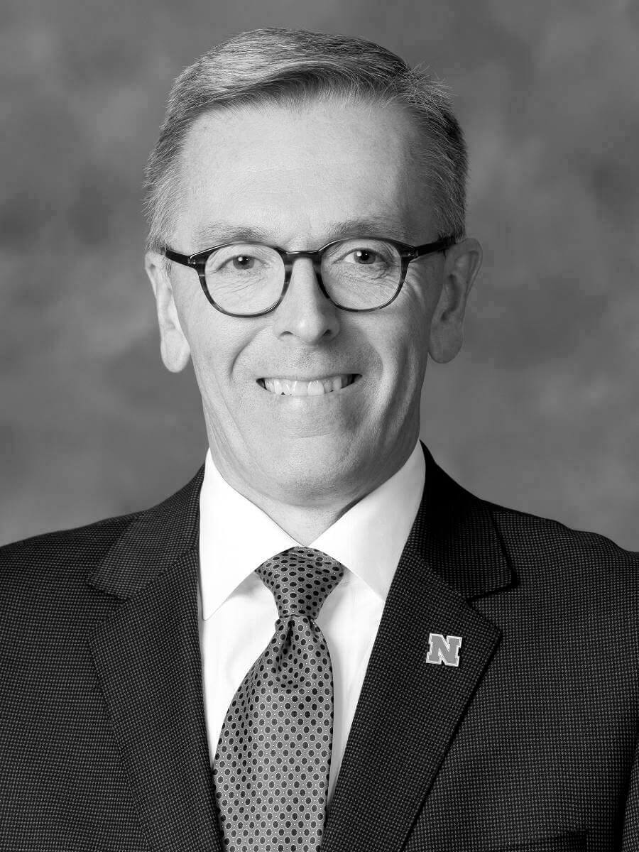 black and grey headshot of chancellor green