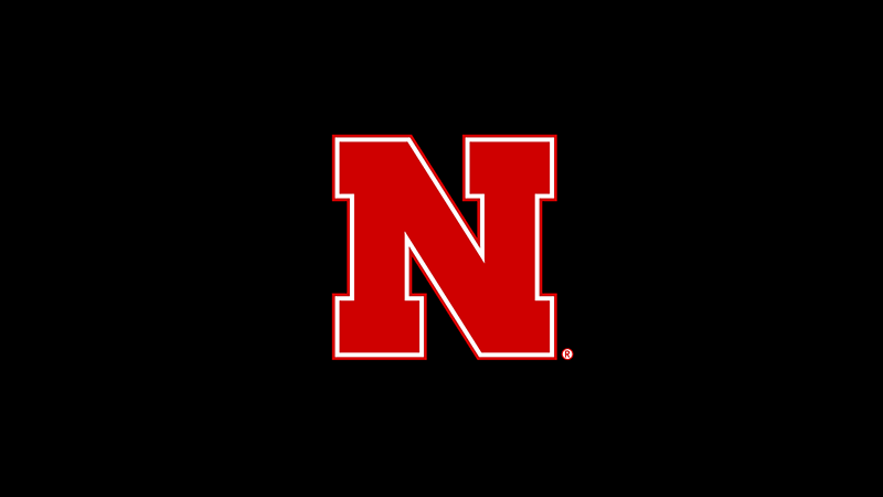 the nebraska n against a black background