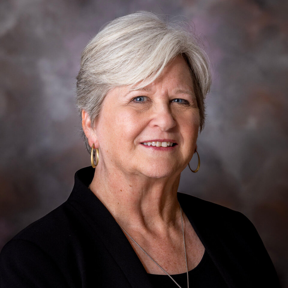 Portrait of Katherine Ankerson against gray background
