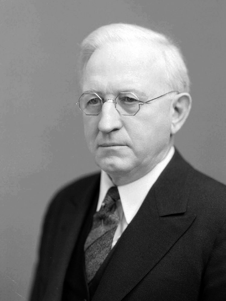 black and grey photo of chancellor burnett