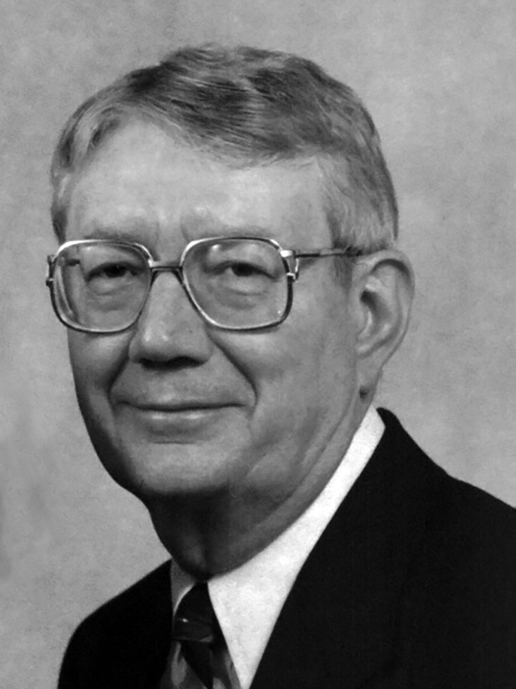 black and grey photo of chancellor massengale